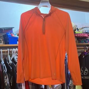 Neon orange zip-up, v-neck, turtle neck, thin, light weight jacket.